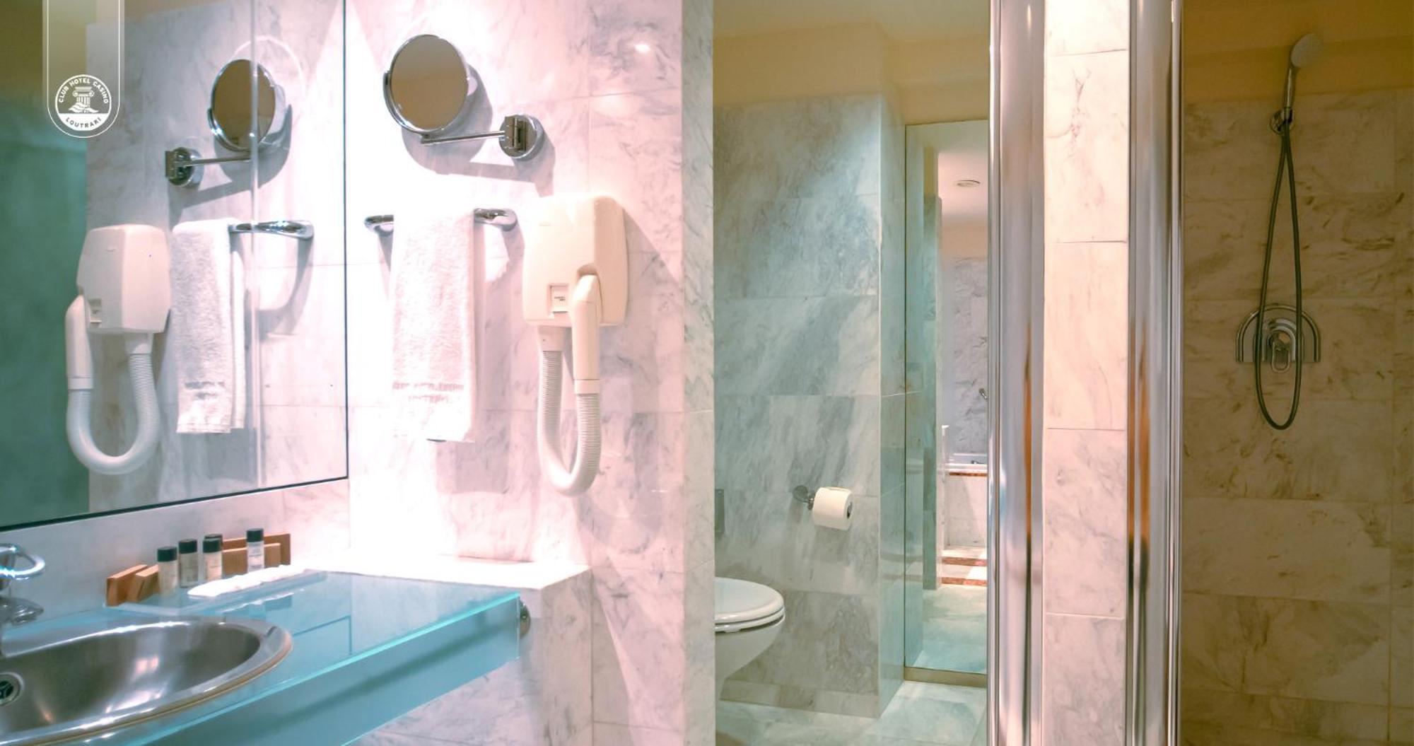 Club Hotel Casino Loutraki Exterior photo A shower cubicle